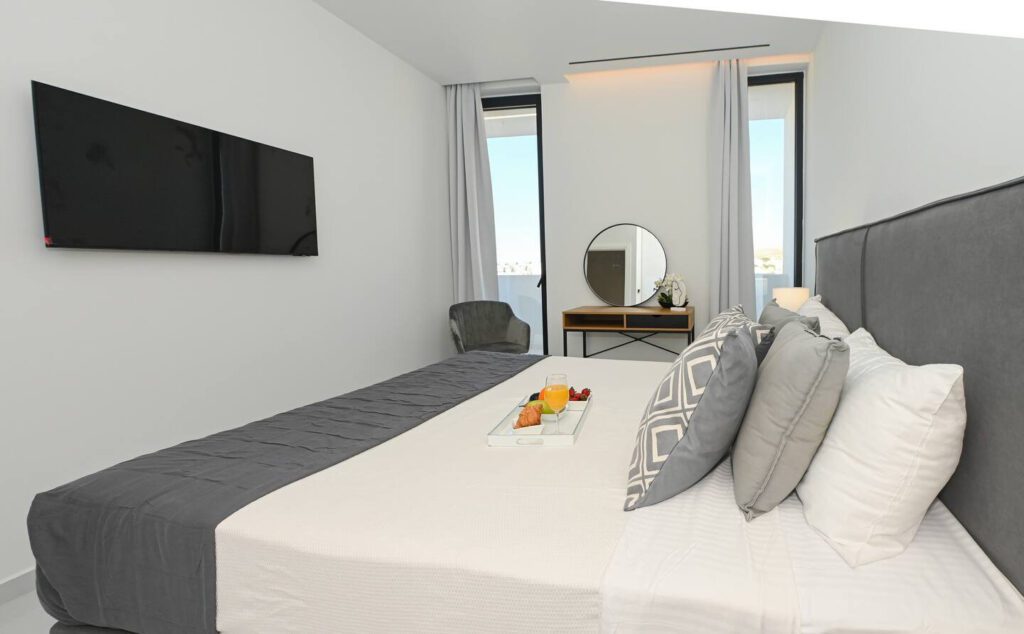Bedroom A (2) of City Gem Suite Heraklion Crete at KM Living